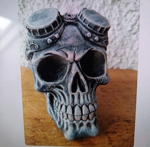 Stone garden skull with