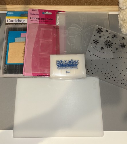 Bundle embossing folders - of,