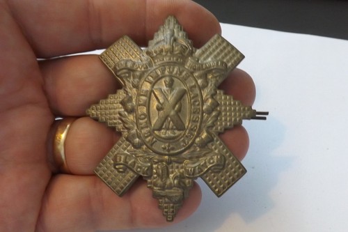 Military badge the - the, black