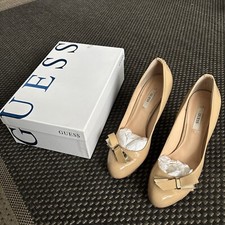 Guess patent court shoes with bow 