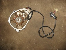 Stator with housing and wiring