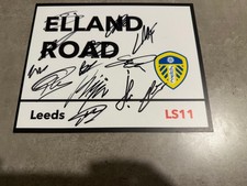 LEEDS UNITED SIGNED 2025 METAL STREET SIGN FOOTBALL PROOF SHIRT BALL PHOTO 
