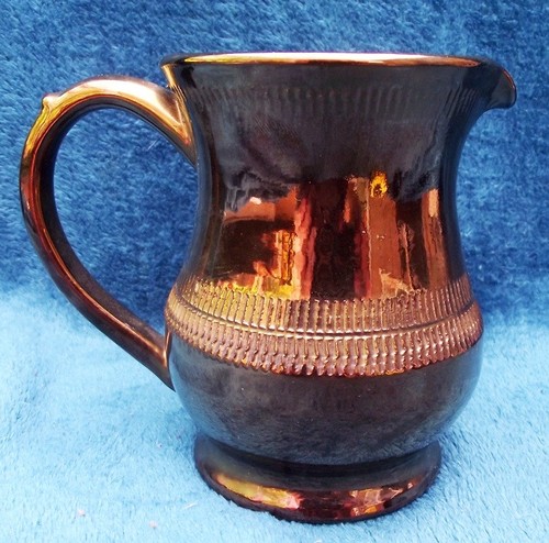Two creigiau pottery items - two,