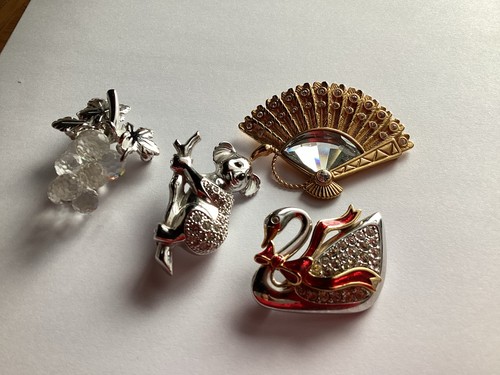 Swarovski brooches 4 - swarovski, x