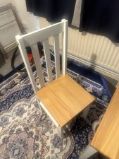 Dining Table And Four Chairs