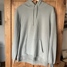 H&M Unisex Hoodie. Relaxed Fit. Size Medium Adult. Pale Green/Bluish Colour.