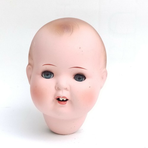 Antique composition doll head