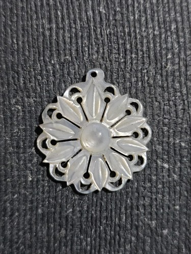 Carved mother pearl - carved,