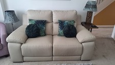 Modern electric reclining leather sofa in excellent condition.   