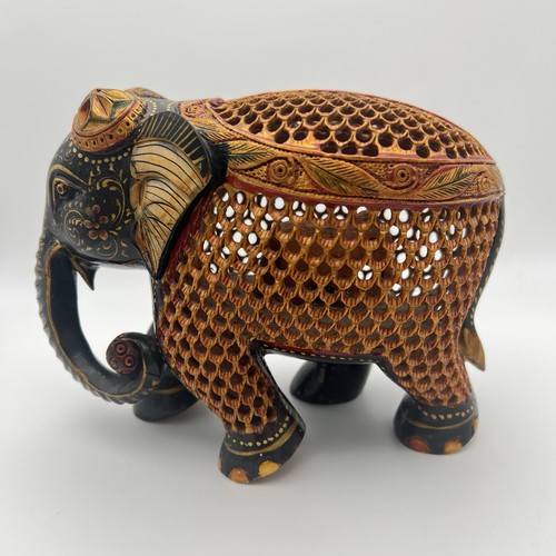 Hand carved wooden elephant - hand,