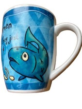 history and heraldry mug. WORLDS GREATEST FISHERMAN.  Nice condtion.