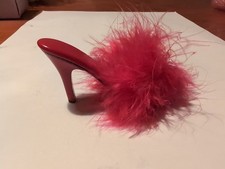 If the shoe fits. Leonardo collection. Red fluffy shoe