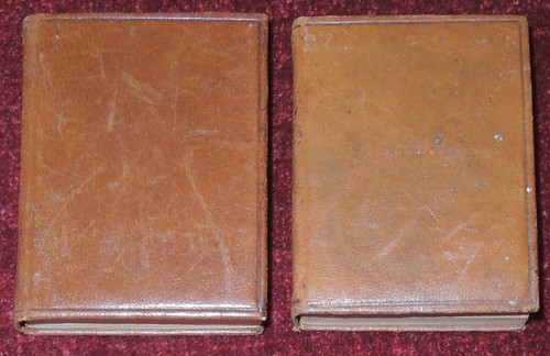 Two miniature leather bound - two,