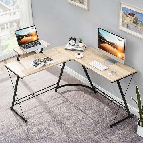 Corner desk shaped computer - desk,