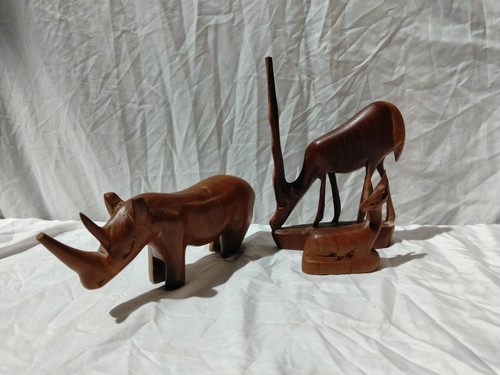 Hand carved wooden rhino - hand, &