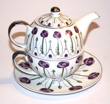 One person teapot with cup in Charles Rennie Mackintosh Style.