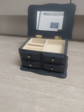 small, dark blue wooden