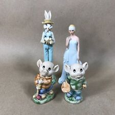 Assorted Porcelain Figurines Set of 4