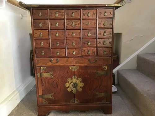 Antique apothecary cabinet
