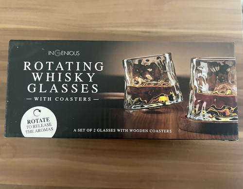 Rotating whisky glasses with - whisky,