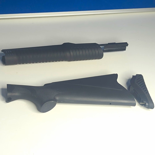 Black polymer gun stock - gun,