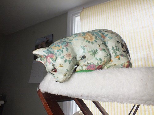 Floral patterned china cat
