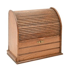 An Oak Stationery or Letter Rack, Art Deco C1930, with Tambour Shutter