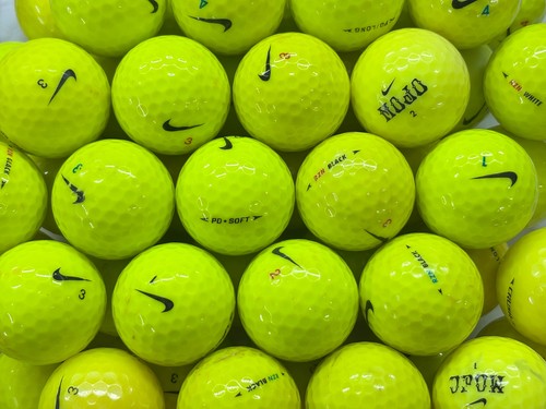Yellow golf balls - golf,