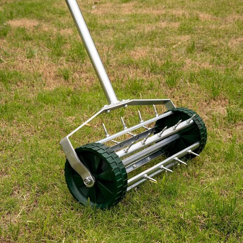 Lawn aerator rolling - lawn,