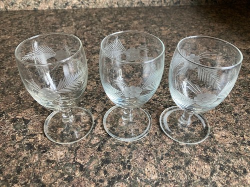 Three vintage stemmed glasses