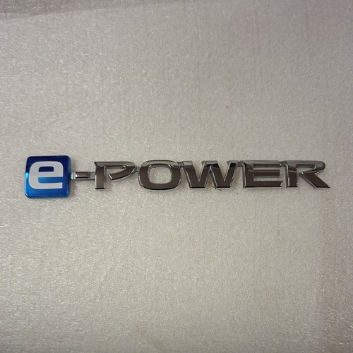 Nissan power door badge - door,