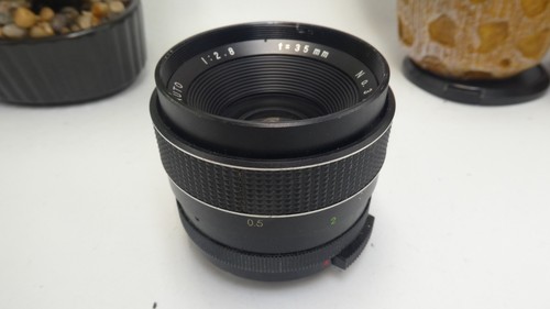 Optomax auto 35mm 8 - 35mm, f/2.8