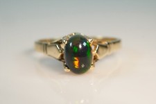 Fabulous Solid Black Opal cathedral Ring in 9ct