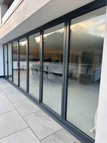 Grey aluminium bifolding doors - aluminium,