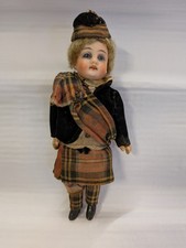 Antique bisque headed doll, original clothes, lovely face. 19cm.
