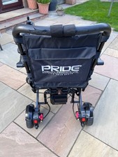 Pride folding electric wheelchair.  Lightly used, indoors some scuffs