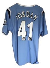 Manchester City match worn shirt Steven Jordan .(Numerous signatures on front)