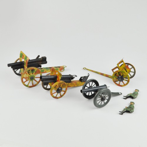 Old tin toys cannons - cannons,