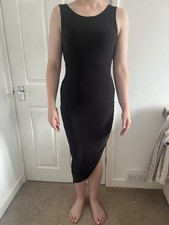 Miss Blush Black Bodycon Dress With X Over Back. Asymmetrical Skirt, S12