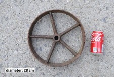 old vintage cast iron wheel -