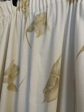 Pair Of Cream Curtains With