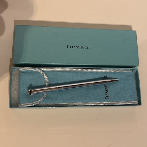 Tiffany executive t clip - co., t-clip