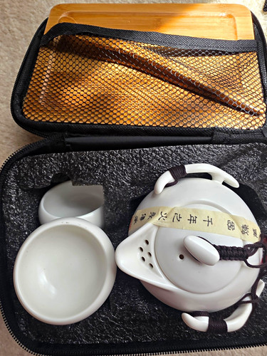 White ceramic calligraphy tea - white,
