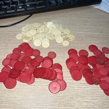 Antique bone gaming counters inlay repairs stained red
