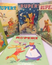 4 vintage Rupert bear books and one sooty story book 