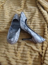 Evie peacocks Woman's Snake