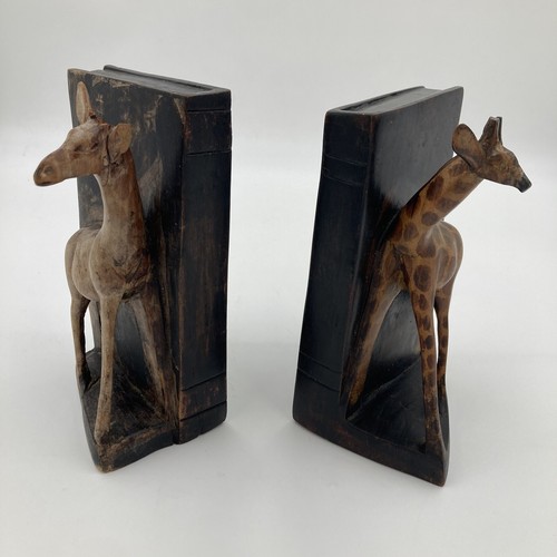 Hand carved wooden giraffe - hand,