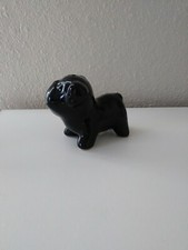 solid black collectible pug