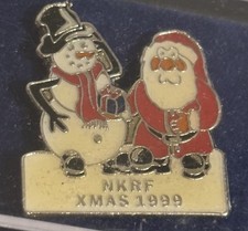 Enamel Santa Father Christmas snow man NKRF Xmas 1999 badge 