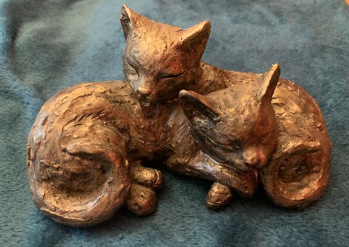 Bronze effect cuddling
